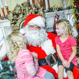 Santa visits with twins